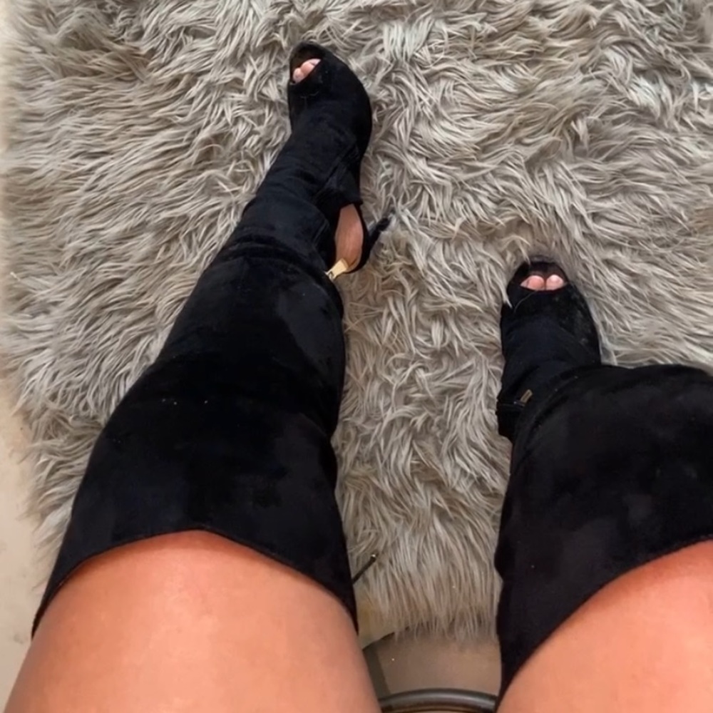 Black thigh high boots